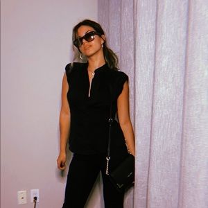 Short sleeve black Dalia blouse.